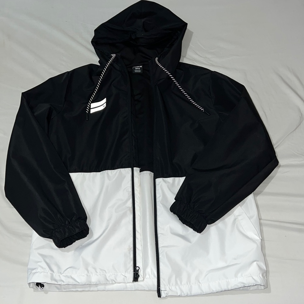 black and white hurley rain coat.